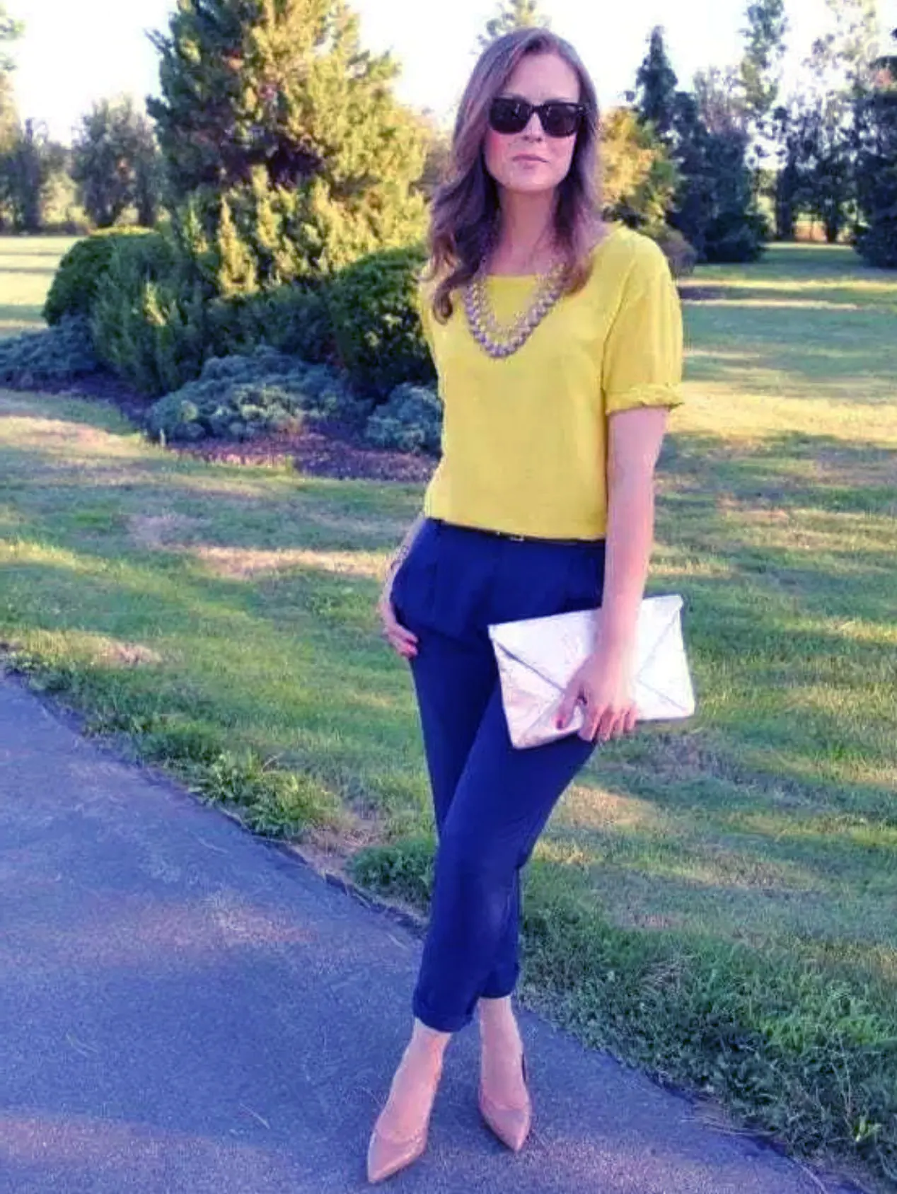 Bright top with navy pants