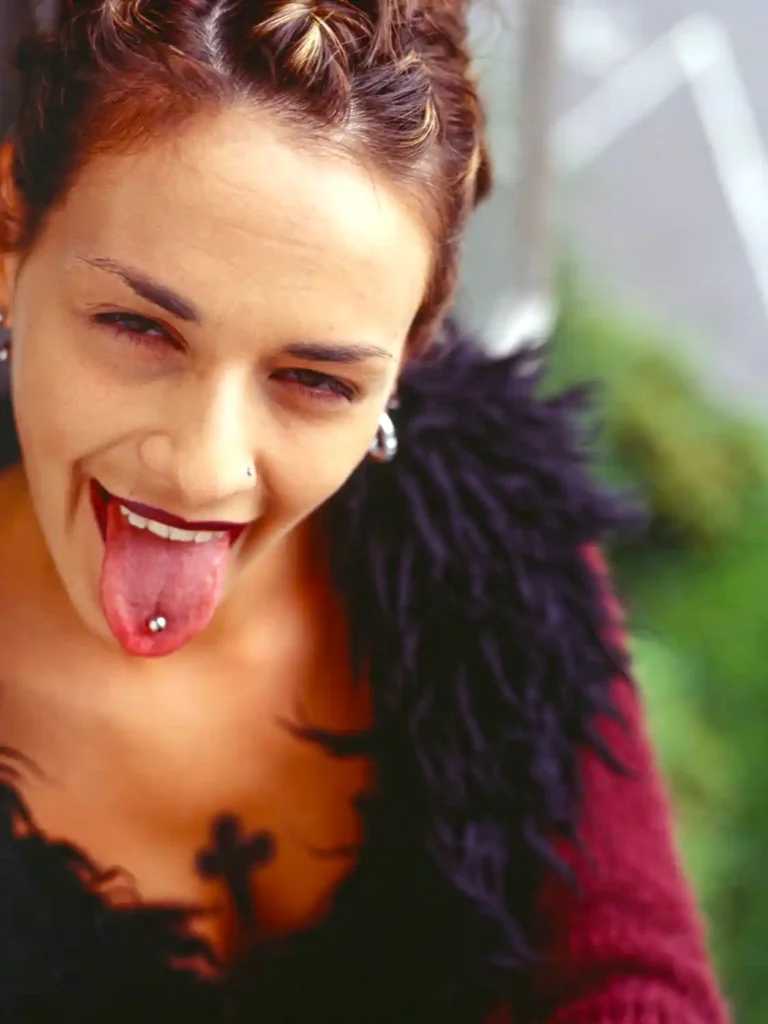Girl get their tongue pierced
