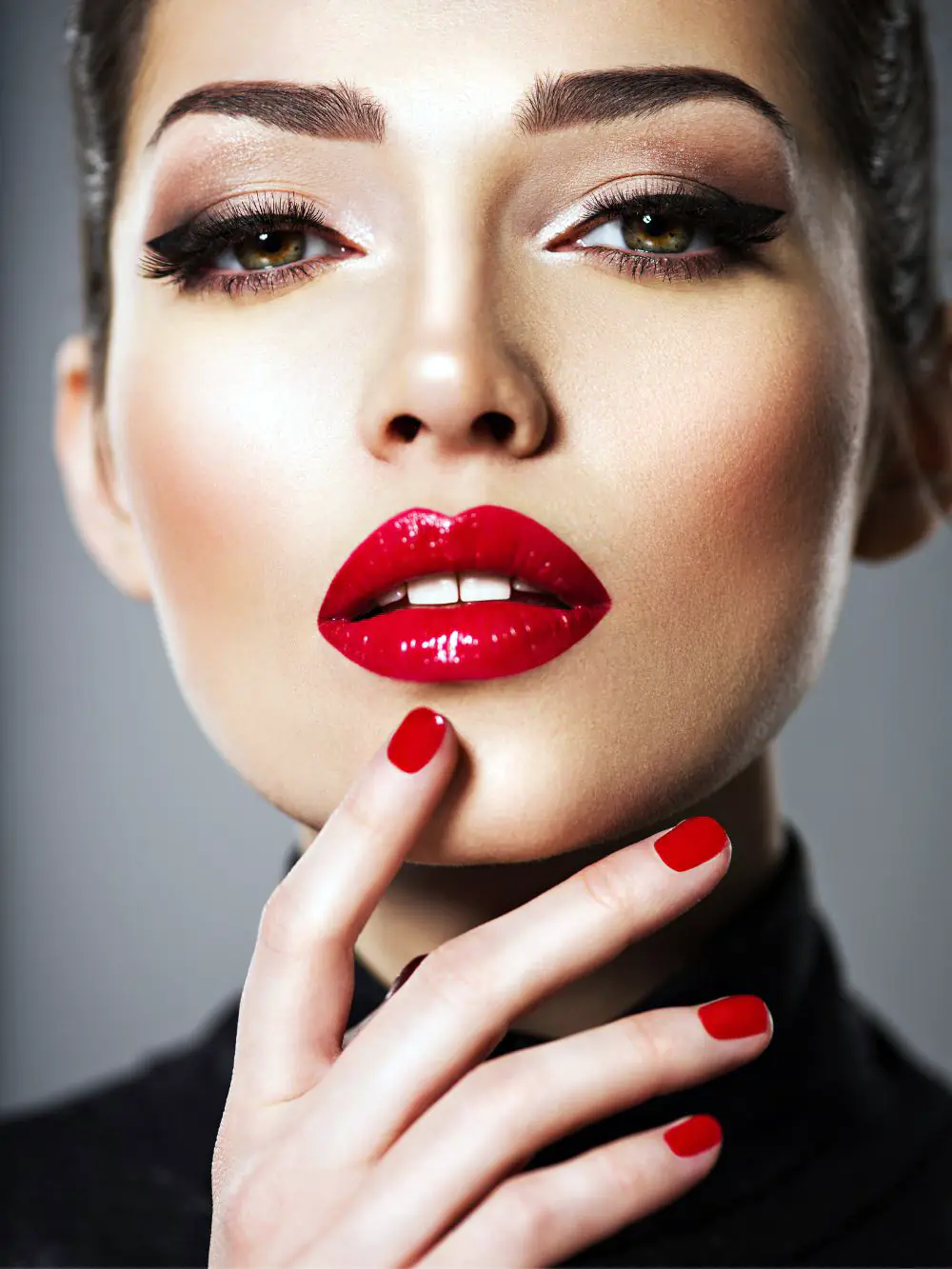 Girl's makeup with red lipstic