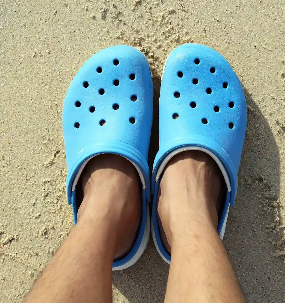 Blue Crocs on the beach