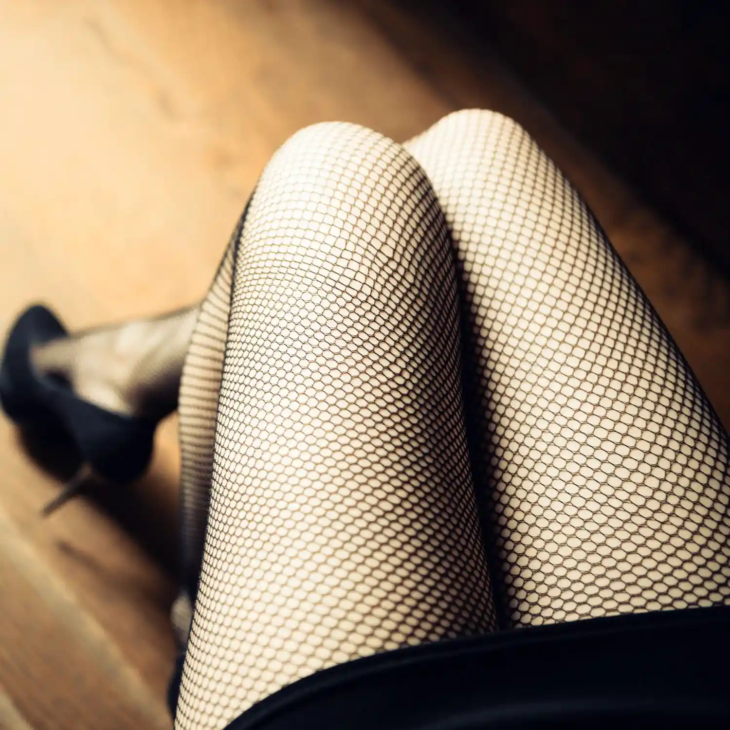 Fishnet stockings on girls legs