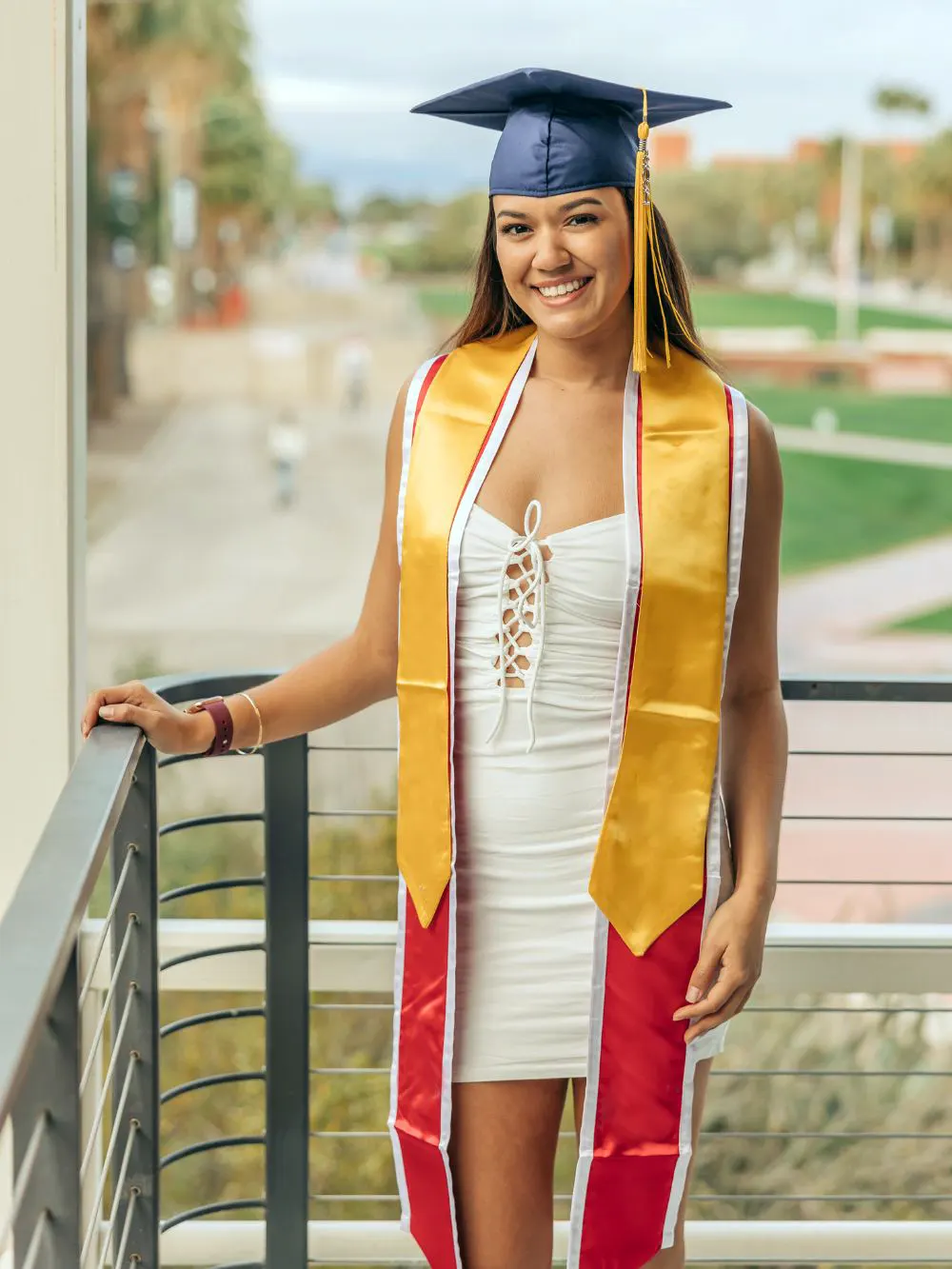 Why Do Girls Wear White For Graduation? 2 Girl wearing a white dress on graduation