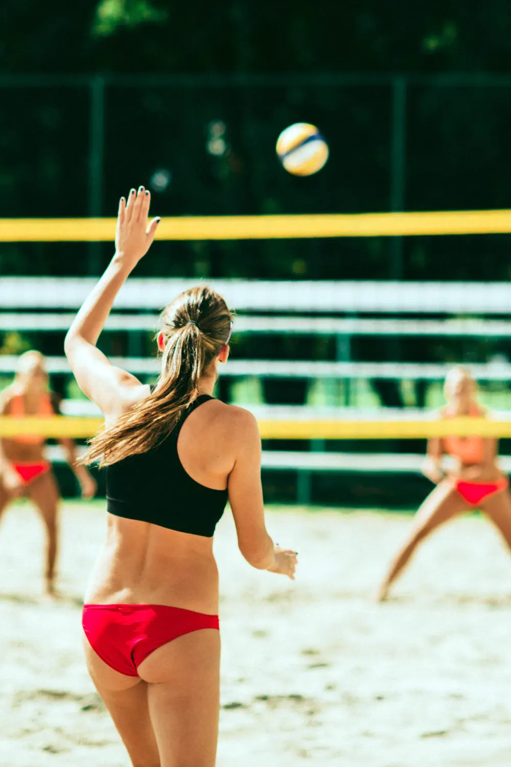 Girls playing beach volleyball