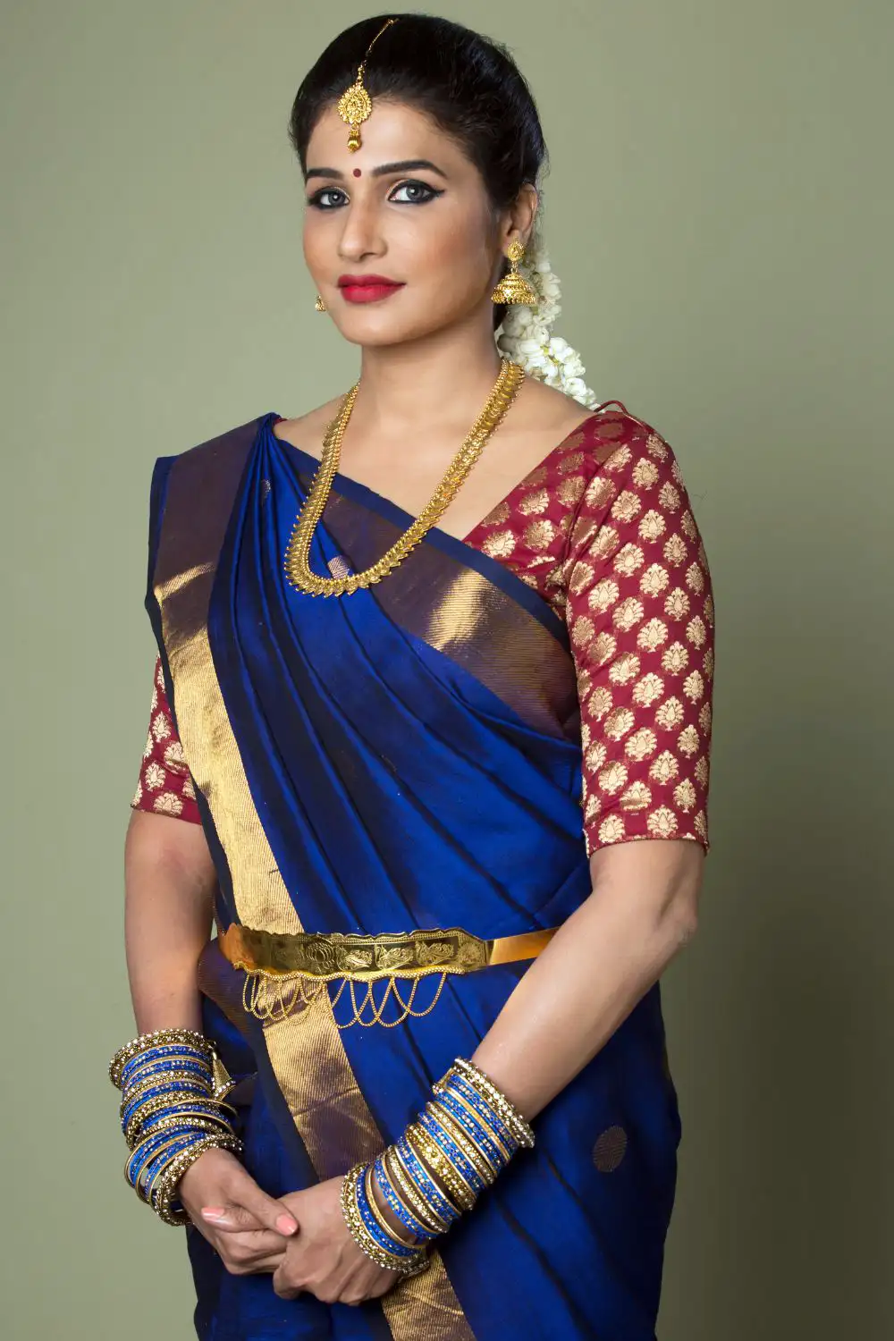 Indian women in traditional saree bride attire