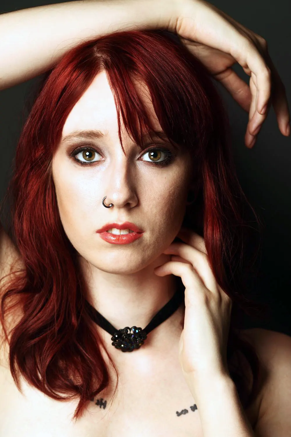 Redhead girl with nose ring