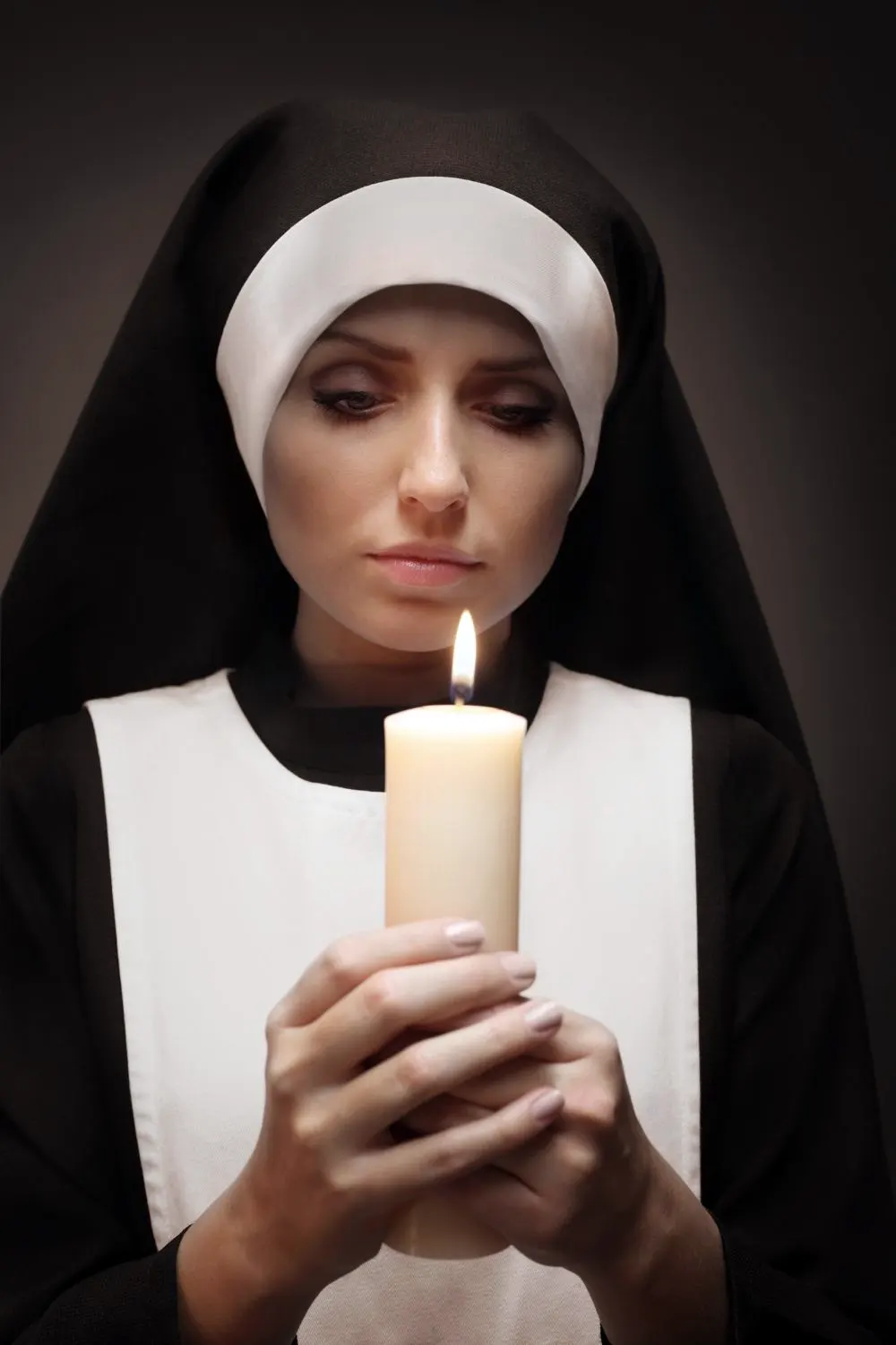 Young Nun With Shining Candle