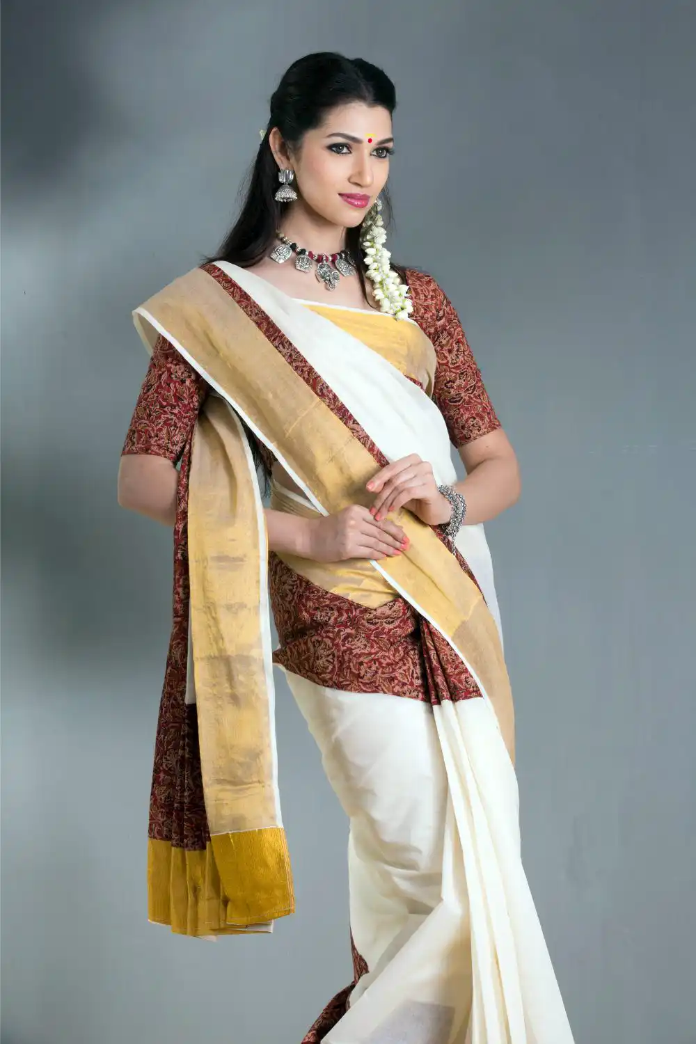 Charming Indian woman in traditional saree